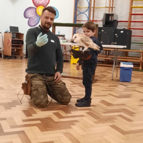 The owls landed on our hands!