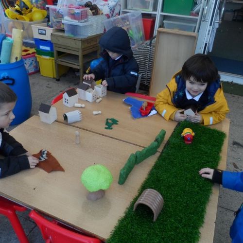 Reception have linked their Geography and Literacy learning. They used building blocks to make a map of the town where 'The Smartest Giant in Town' lives.